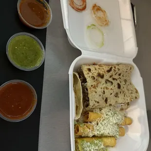 3 rolled tacos and quesadilla