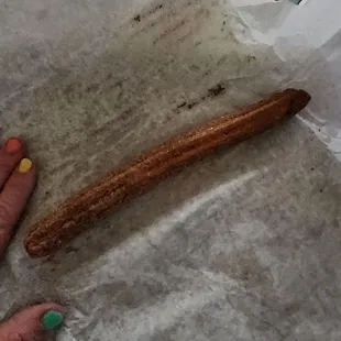 Churro, piicture does not do it justice. It was really tasty and lots of cinnamon and sugar. Yummy