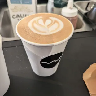 Kuro (Okinawa black sugar oat milk latte, topped with sea salt)