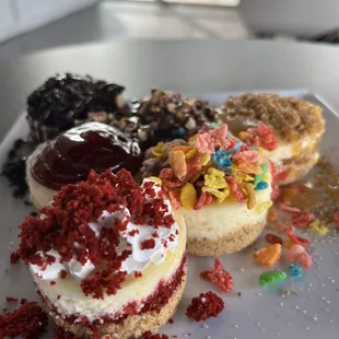 Red velvet, fruity pebbles, cookies and cream, strawberry, turtle, and apple pie