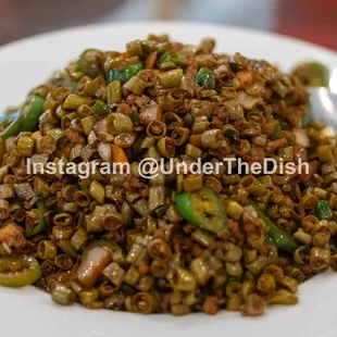 a plate of food with a spoon