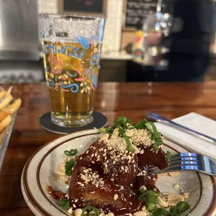 Pork belly nugs.  Too saucy and a bit hard dry. Prob why it was sauced up. Flavor was good.