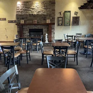 a dining room with tables and chairs