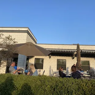 a group of people sitting outside