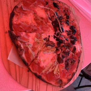 Great pizza (under a red tarp)
