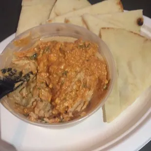 Hummus and pita with spicy feta on top