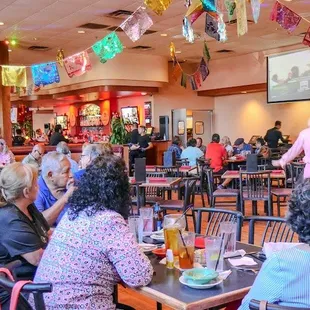 Step into our beautifully designed dining room, where comfort meets sophistication. With its warm ambiance, elegant décor, and welcoming atm