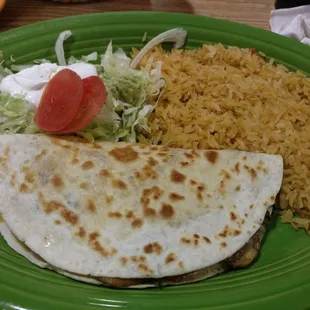 Mushroom and spinach quesadilla. Pleased it had refried beans, which balanced the cheese well