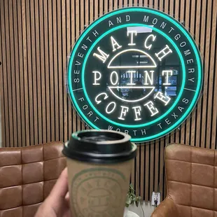 Signage in the podcast room with vanilla latte.