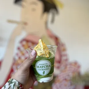 24k Golden matcha-vanilla soft serve in a cup