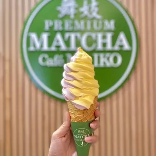 july flavor: strawberry x mango mix soft serve on a waffle cone (07/2024)