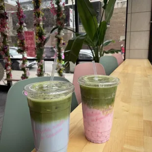 two cups of matcha tea on a table