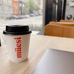 a cup of coffee on a table