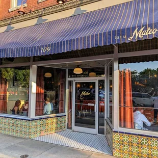 Outside. Storefront. Main front entrance. We parked for free in the city parking lot behind the restaurant. Enter via Ramseur St.