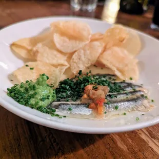 Boquerones. $12. Spanish anchovies, vinagreta, avocado puree, potato chips.