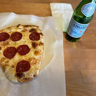 Pepperoni slice fresh from the oven.