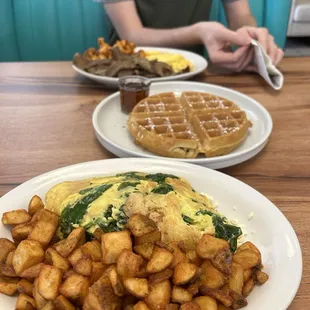 Spinach and feta omelette with the house potatoes. Also came with pancakes for a side.