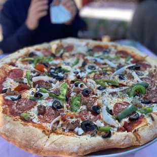 Supreme pizza without mushrooms.