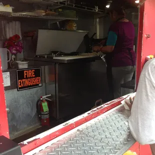a fire extinguisher in a fire truck