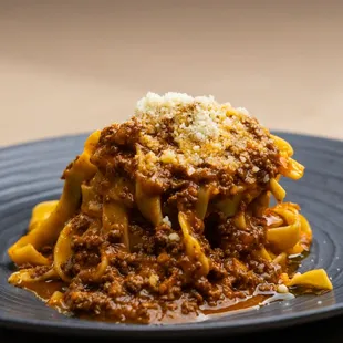 Tagliatelle Verde Bolognese - 
Traditional slow braised wagyu beef ragu