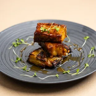 Pork Belly - 
Crispy slow braised pork belly, potatoes gratin, honey glaze, microgreens