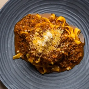 Tagliatelle Verde Bolognese - 
Traditional slow braised wagyu beef ragu