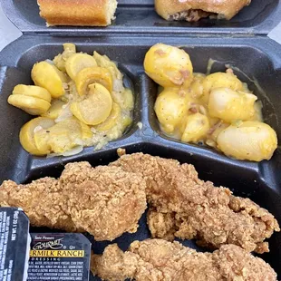 Chicken Strips with two sides, includes bread and dessert.
