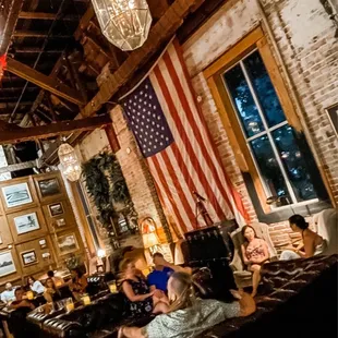 High ceilings and period furnishings add to the feel