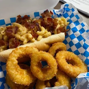 a hot dog with macaroni and cheese