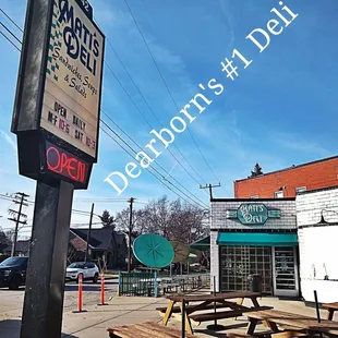 picnic tables and a sign