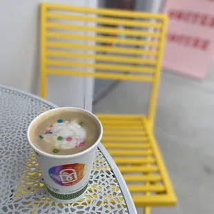 a cup of coffee on a table