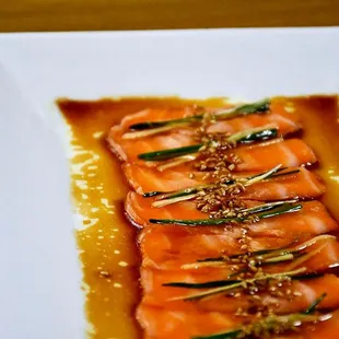 a plate of food on a wooden table