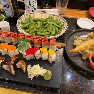 Tempura appetizer, edamame, Matsui roll, Rainbow roll, and unagi sushi
