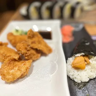 a plate of sushi and rice