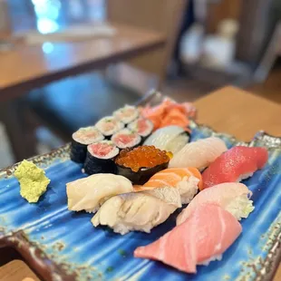 a plate of sushi on a table