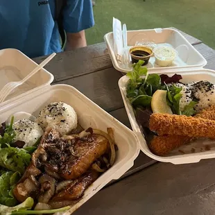 two take out containers of food