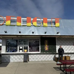 Cute walk up spot with picnic tables for enjoying your eats