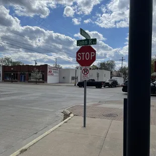 a stop sign and street signs