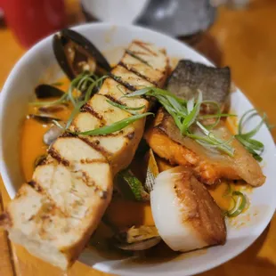 Seafood stew and roasted beet salad.