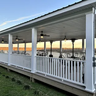 Our outdoor dining option is situated atop a high embankment that offers a commanding view of the river and wetlands.