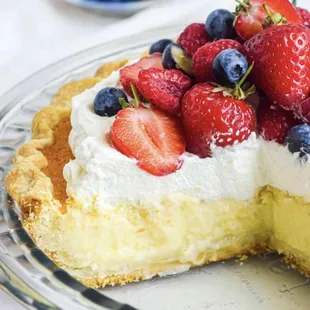 Buttermilk pie with real whipped cream and fresh fruit!