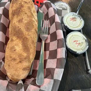 Brisket Texas Roll. It&apos;s a large pill shaped Stromboli. The dips for this are good!