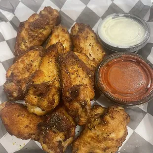 Lemon pepper wings with a side of hot buffalo