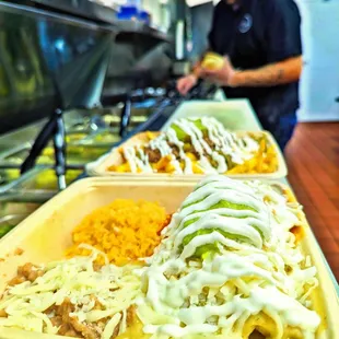 a man preparing food in a restaurant kitchen