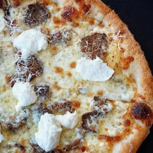 The 'Vampire Slayer' with house-made meatballs &amp; fresh ricotta cheese! Hand tossed NY-style pizza is our specialty!