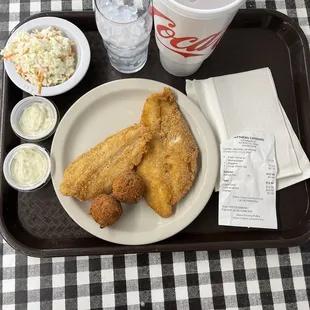 Great catfish hush pups and coleslaw great sweet tea.