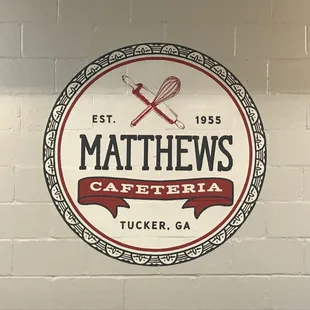 Restaurant&apos;s logo on the dining room wall.