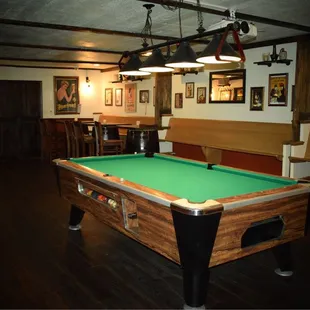 The pool room.