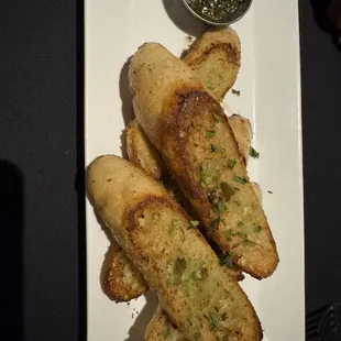 Bread service with a pumpkin seed pesto