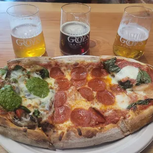Pizza sampler with the recommended beer pairing.